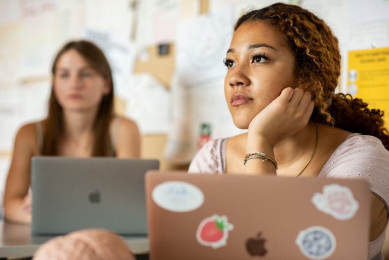 Pupil studying on a laptop at SCHS, an all-girls & private senior school in Streatham & Clapham, London.